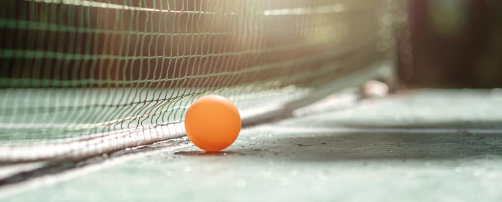 Ping pong ball on table - header